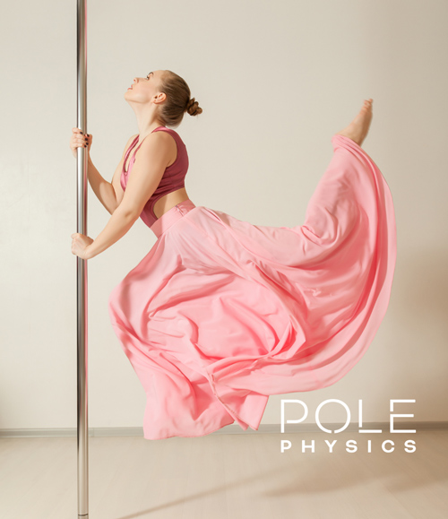 dancer in pink clutching a pole