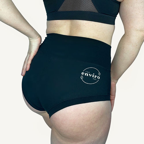 woman wearing EnviroCo’s Onyx Period Shorts for Pole